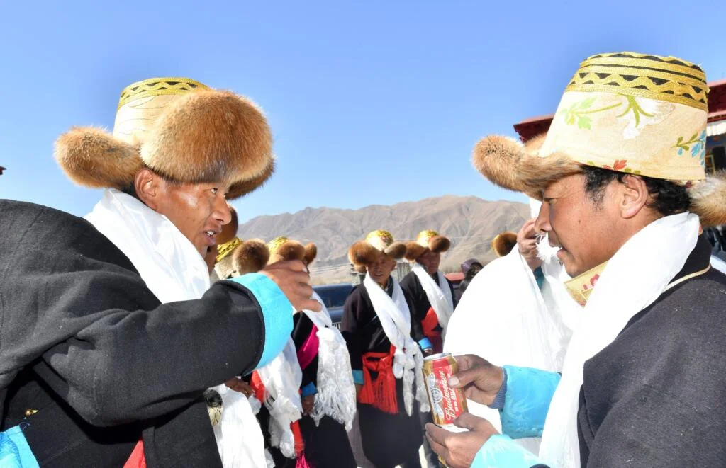 Losar drinking beer scaled