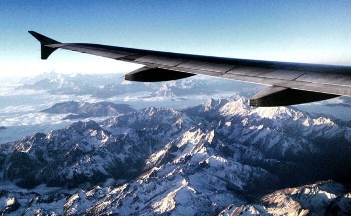 flying on top of snow mountain