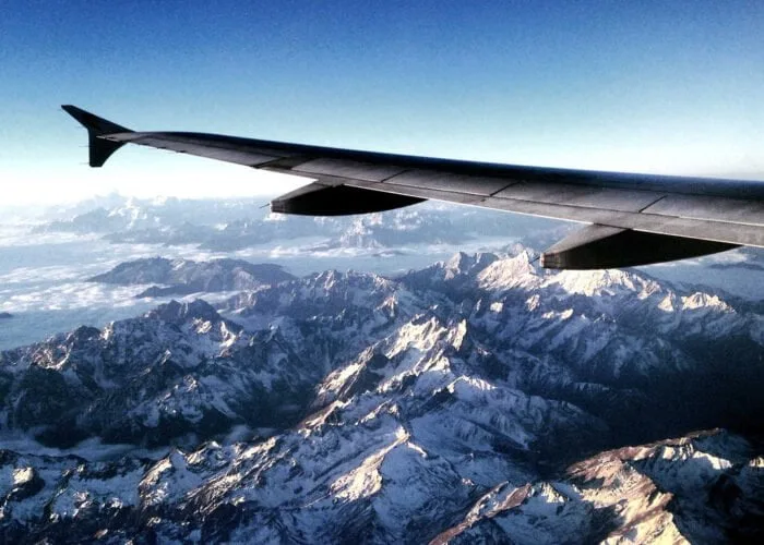 flying on top of snow mountain