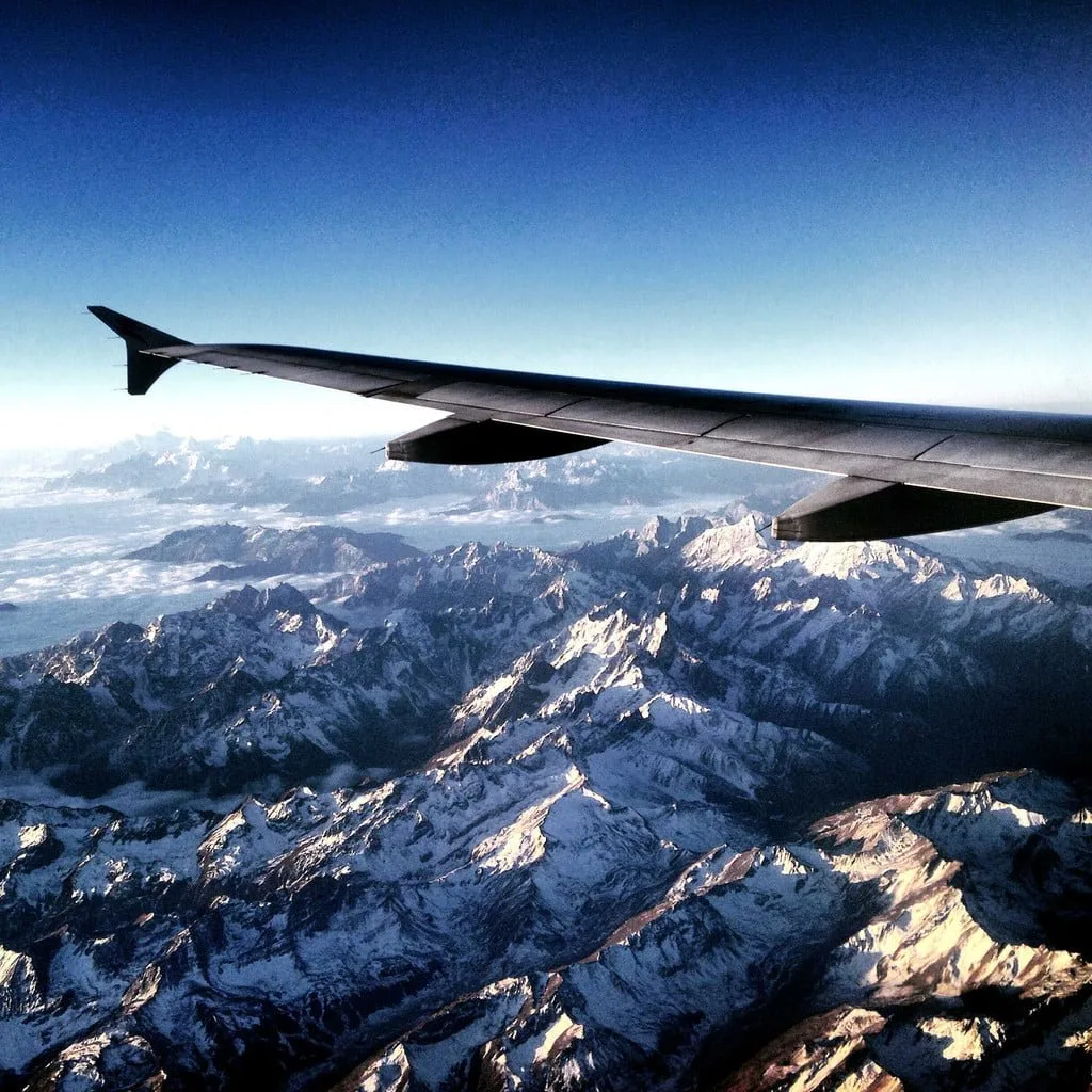 flying on top of snow mountain