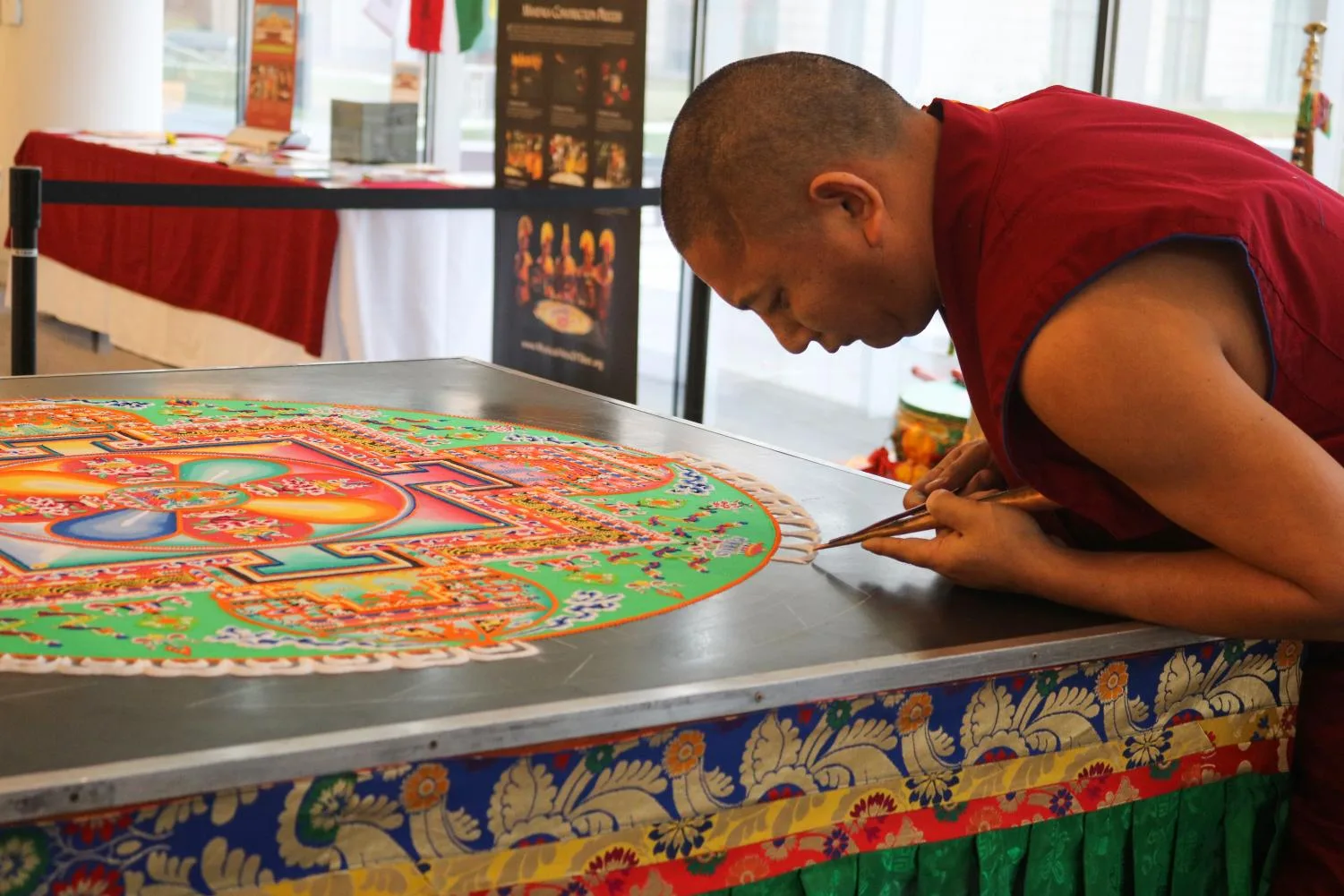 monk preparing mandala