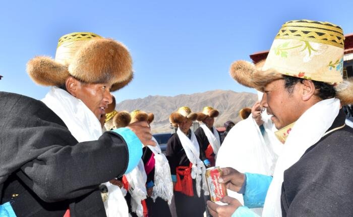 Losar drinking beer scaled