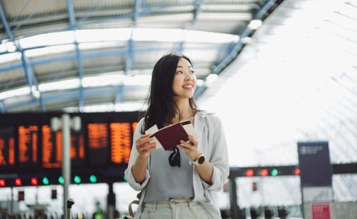 How to get a china visa asian beautiful woman waiting for boarding luke chan gettyimages herorenditionimage900600